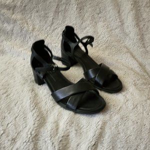 Black leather heeled sandals
